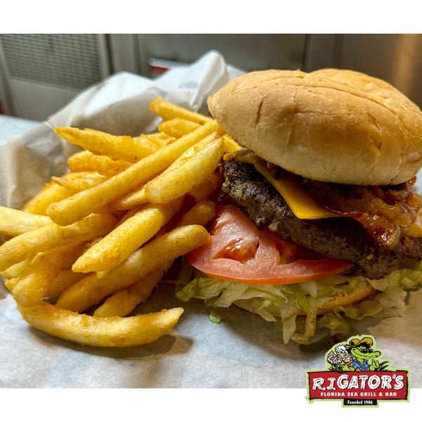 RJ Gator's bacon cheeseburger with lettuce, tomato, and a side of golden french fries.