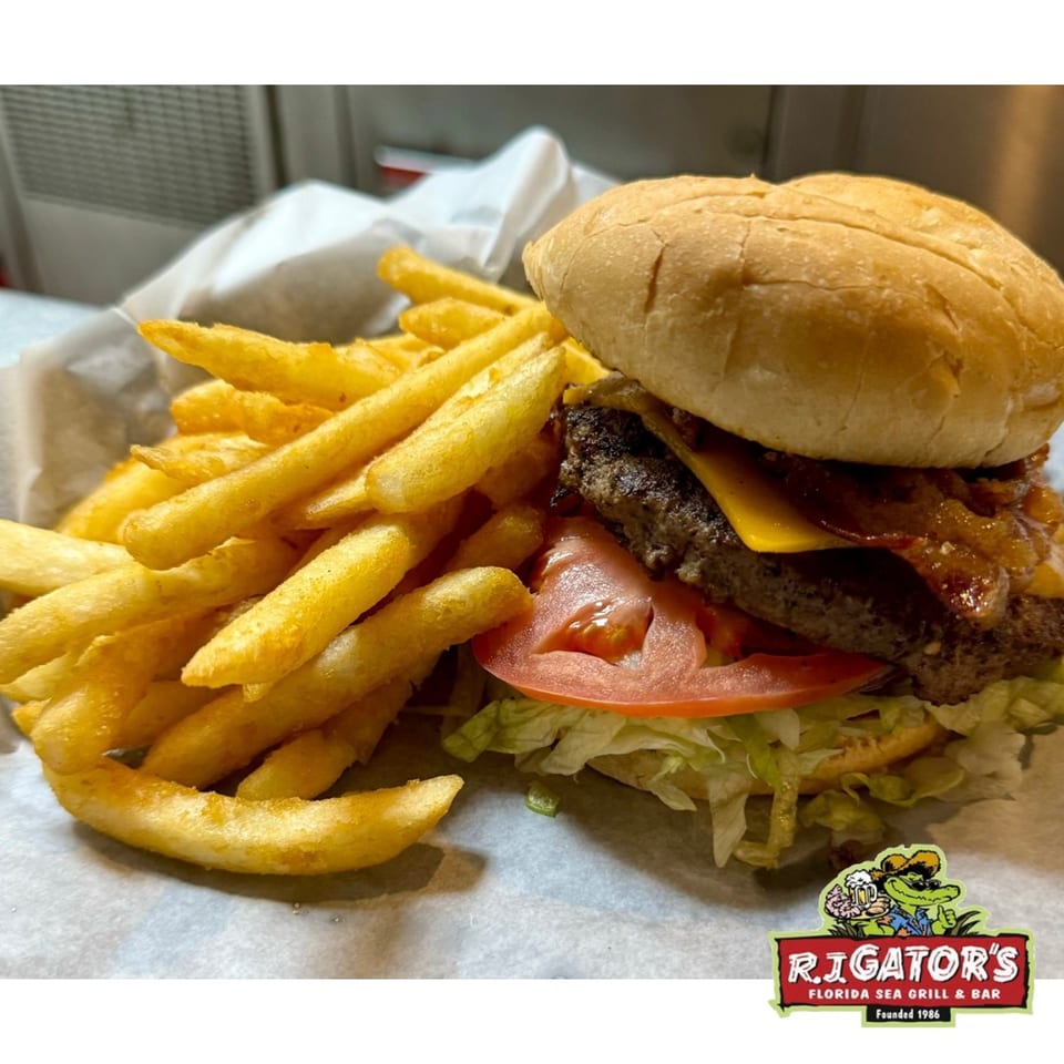 RJ Gator's bacon cheeseburger with lettuce, tomato, and a side of golden french fries.