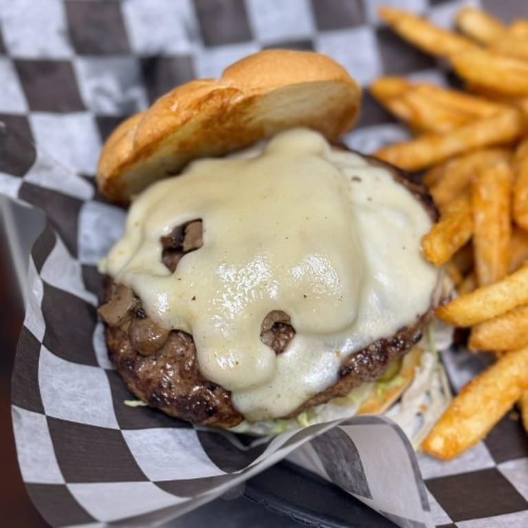 Indulge in Our Swiss Burger
