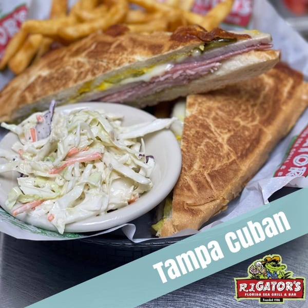 RJ Gator's Tampa Cuban sandwich with ham, cheese, pickles, mustard, and a side of coleslaw.